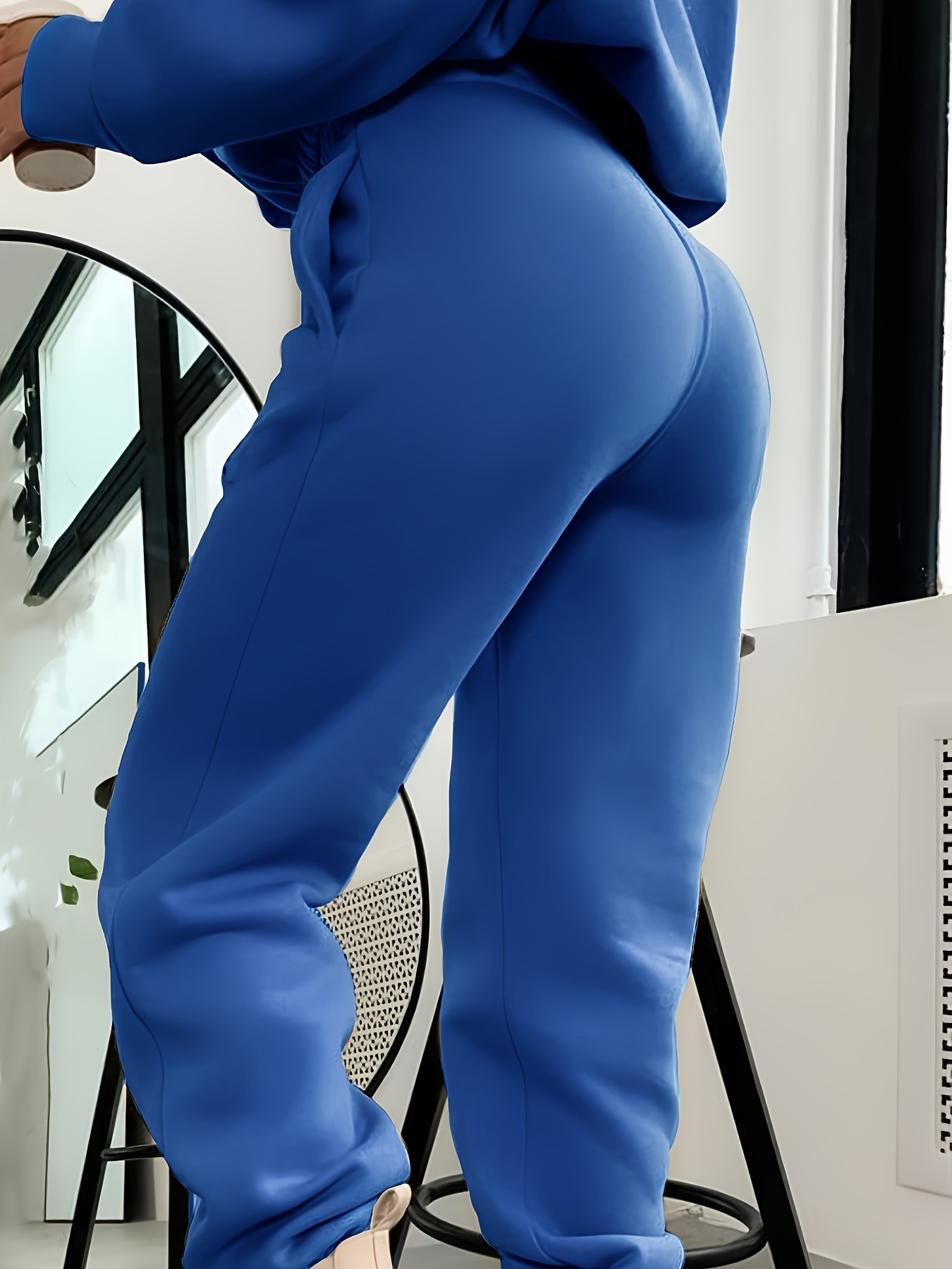 Side view of pants showing pockets and fit