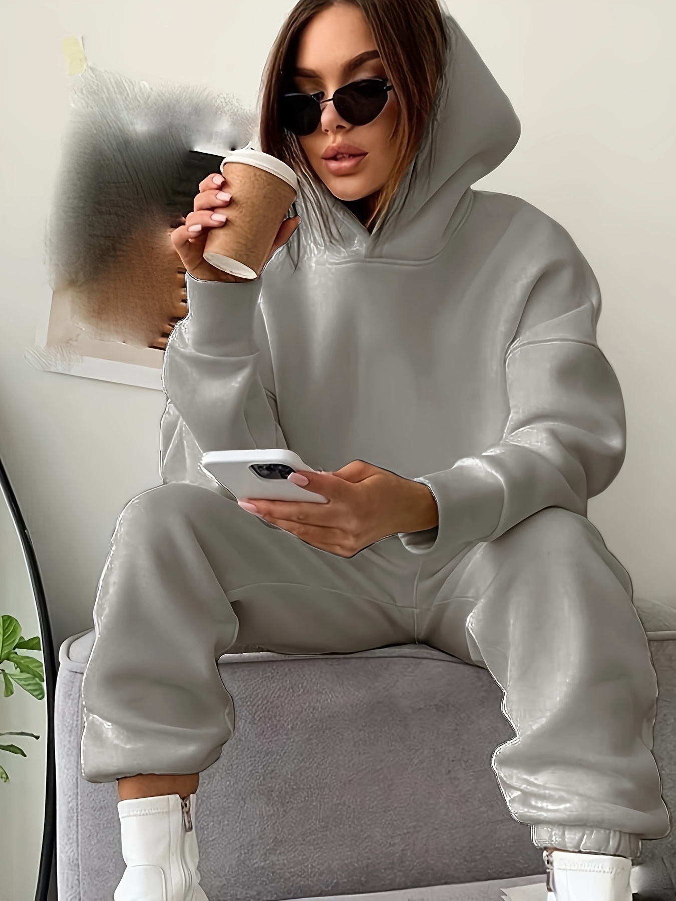 Model posing with hands in pants pockets